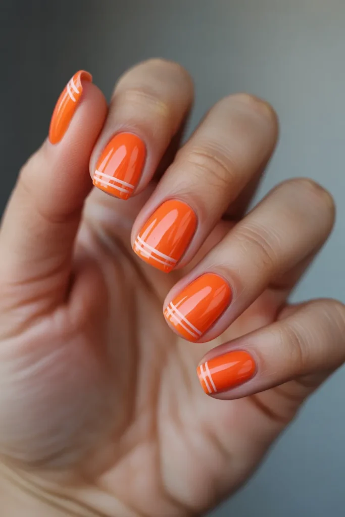 Bright Orange Square Nails with Minimal White Lines