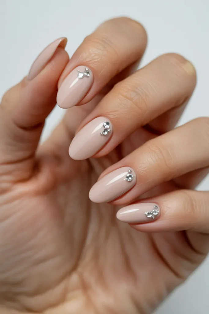 Nude Almond Nails With Tiny Crystal Accents