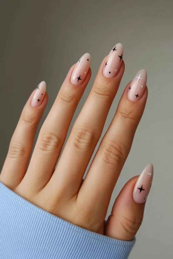 Nude Almond Nails With Tiny Stars